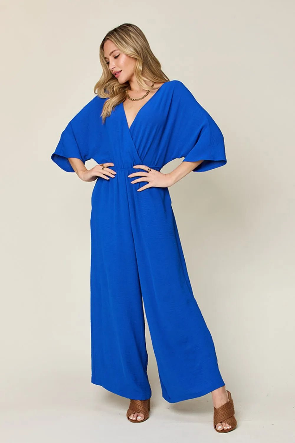Double Take Full Size Surplice Wide Leg Jumpsuit with Pockets - PBNJ FASHIONS