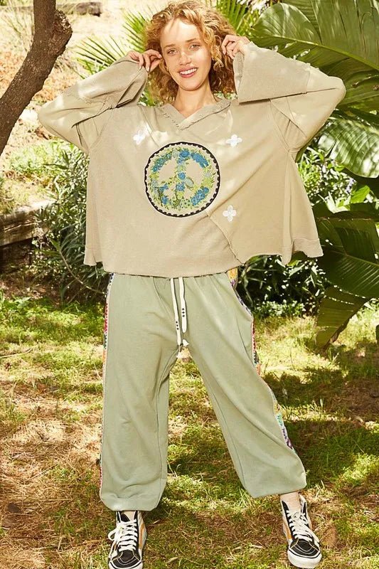 POL Peace Embroidered Exposed Seam Back Ruffle V - Neck Top - PBNJ FASHIONS