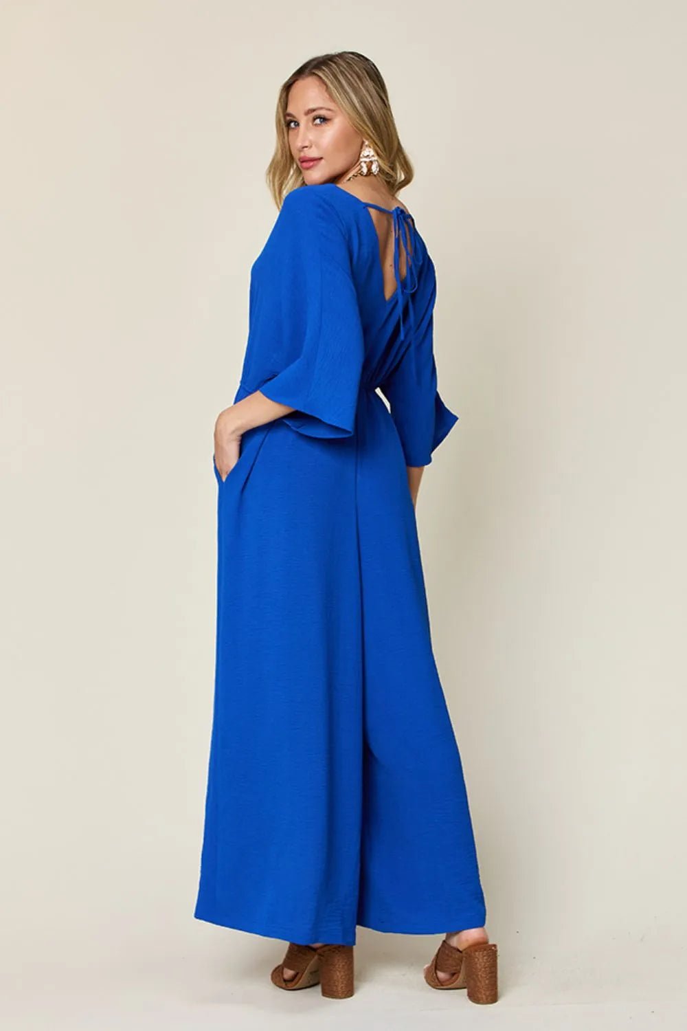 Double Take Full Size Surplice Wide Leg Jumpsuit with Pockets - PBNJ FASHIONS