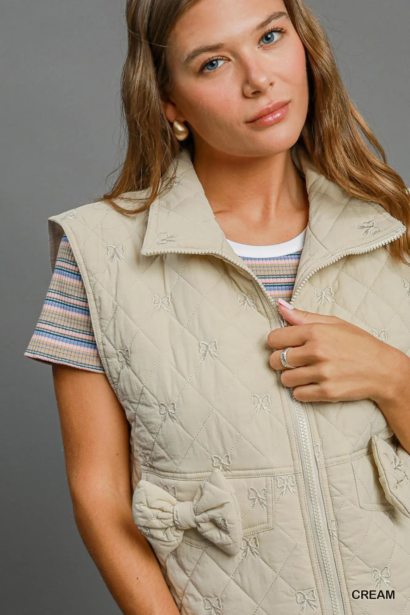 Umgee Sleeveless Quilted Vest with Bow Details - PBNJ FASHIONS